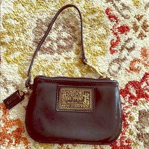 100% authentic coach Wristlet